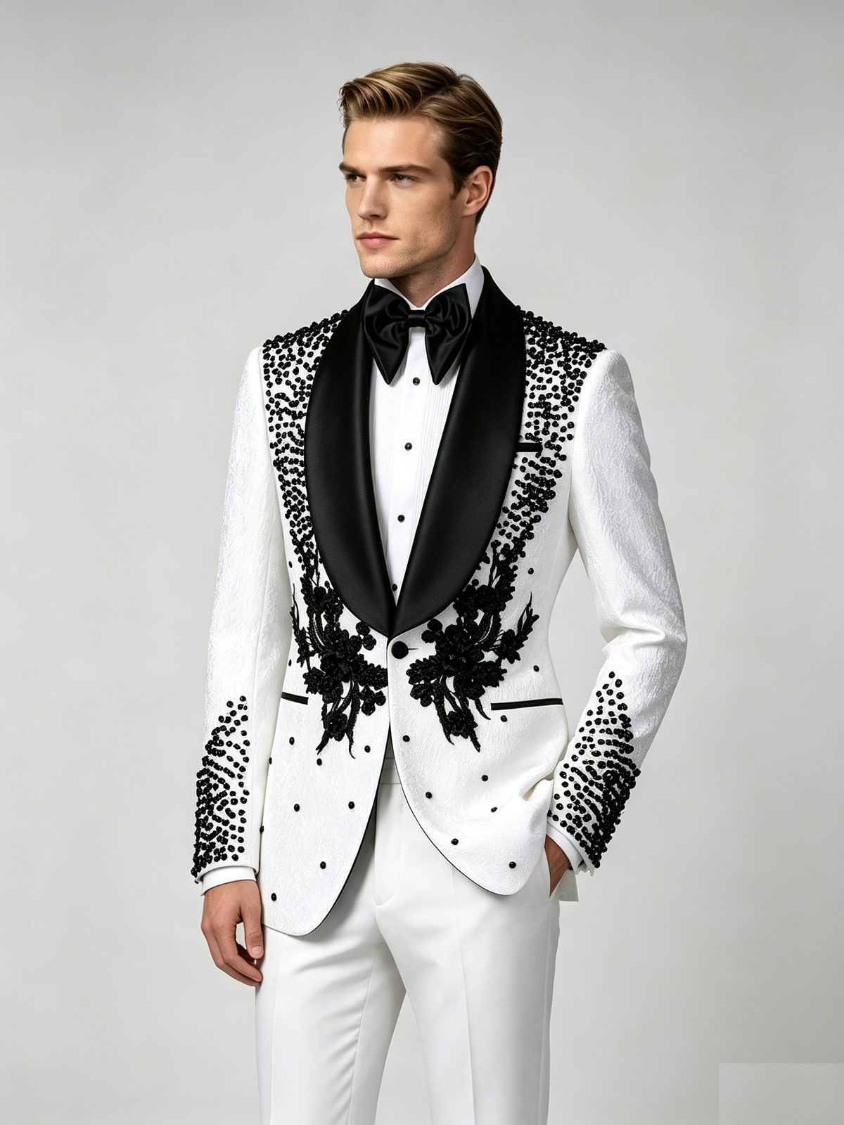 Fully customizable men’s paisley jacquard blazer with hand‑applied rhinestone shawl lapel. Custom fabric, color, size, fit and details, a standout statement piece for formal occasions.